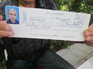 Джамшид пользуется таким документом вместо паспорта; фото: Ц-1